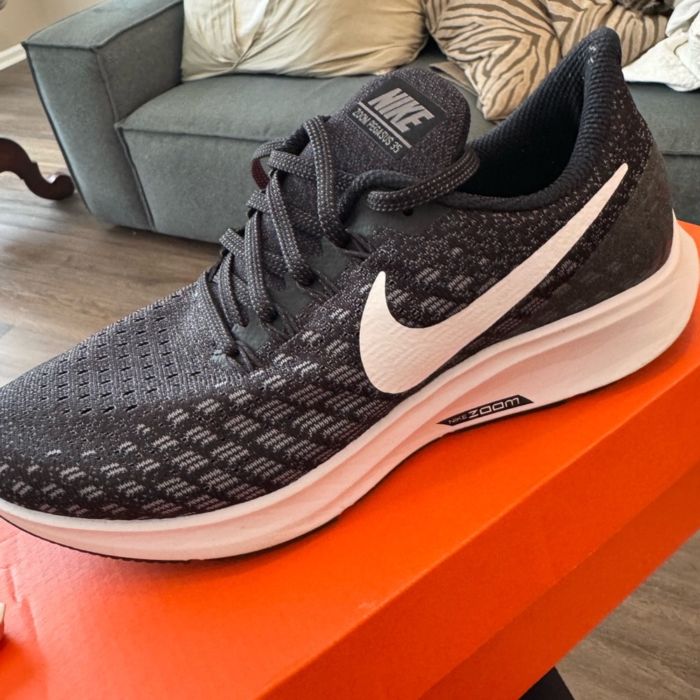 Nike Black and White Sneakers with Knit Upper and Cushioned Midsole